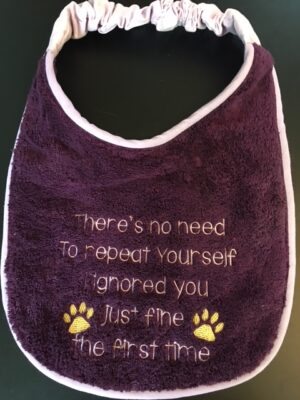 Adult Bib in Purple with slogan "There's no need to repeat..."