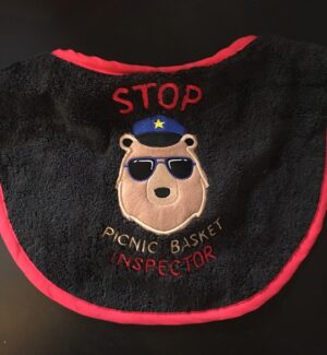 Black and red bib "Stop Picnic Basket Inspector"