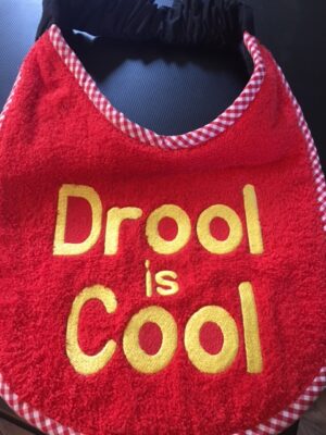 Adult Bib in three colours and slogan "Drool is Cool"