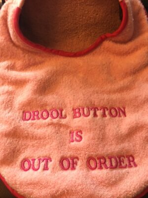 Adult bib "Drool button is out of order"