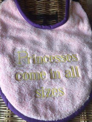 Adult Bib with slogan "Princesses come in all sizes"