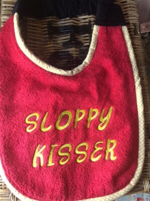 Adult Bib with slogan "Sloppy Kisser"